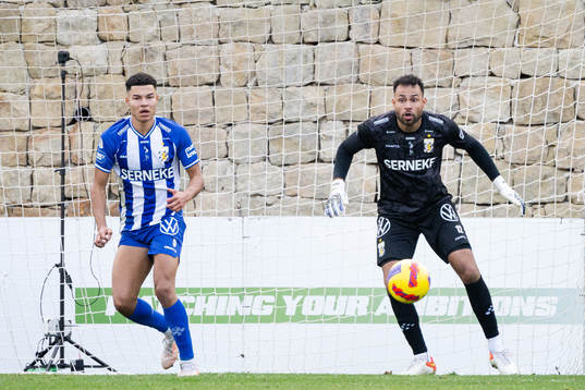 Alexander Jallow and goalkeeper Warner Hahn of IFK Göteborg