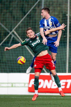 Jan Kuchta of Lokomotiv Moscow and Calle Johansson of IFK
