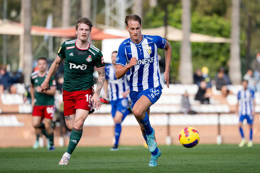 22021 Tin Jedvaj of Lokomotiv Moscow and Oscar Vilhelmsson
