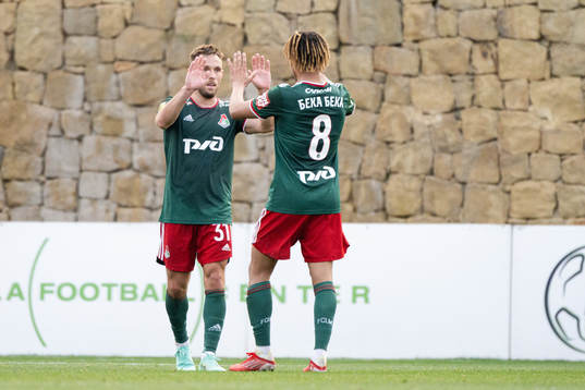 Maciej Rybus and Alexis Beka Beka of Lokomotiv Moscow