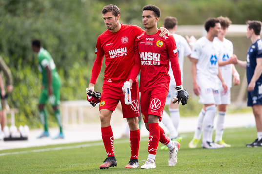 Goalkeeper Oliver Dovin and Davor Blazevic of Hammarby