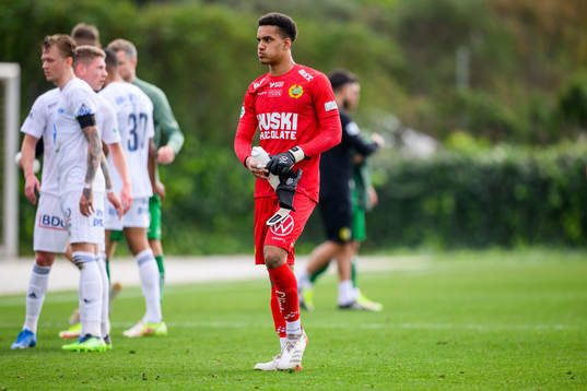Goalkeeper Oliver Dovin looks dejected