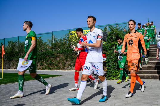 Magnus Wolf Eikrem of Molde enters the pitch
