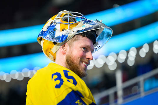 Goaltender Magnus Hellberg of Sweden celebrates