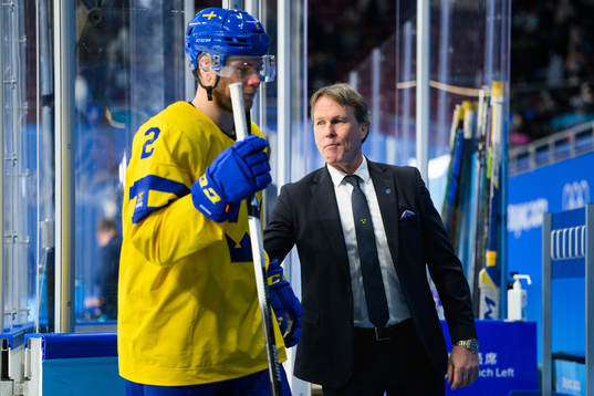 Christian Folin and head coach Johan Garpenlöv of Sweden