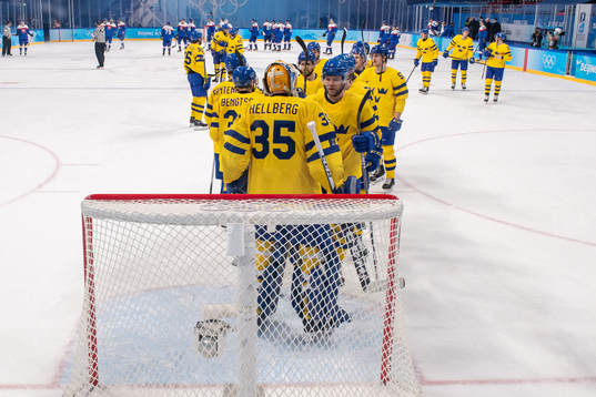 goaltender Magnus Hellberg of Sweden celebrate with