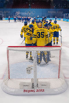 Goaltender Magnus Hellberg of Sweden celebrate with