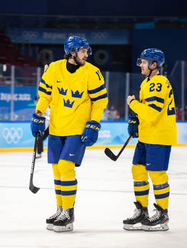 Dennis Everberg and Lucas Wallmark of Sweden in an ice
