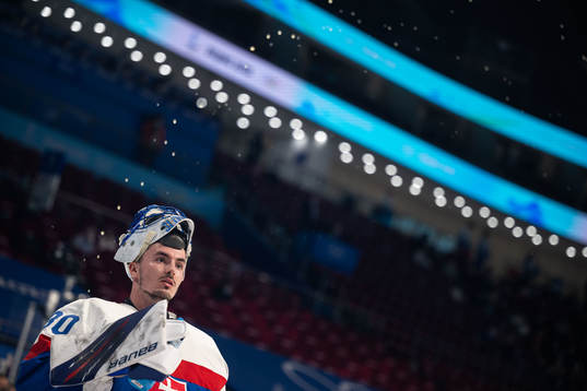 Goaltender Matej Tomek of Slovakia in an ice hockey