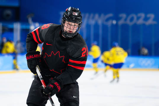 Micah Zandee-Hart of Canada in an ice hockey quarter final