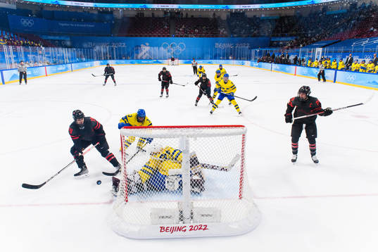 Brianne Jenner of Canada, Anna Kjellbin and goaltender Emma