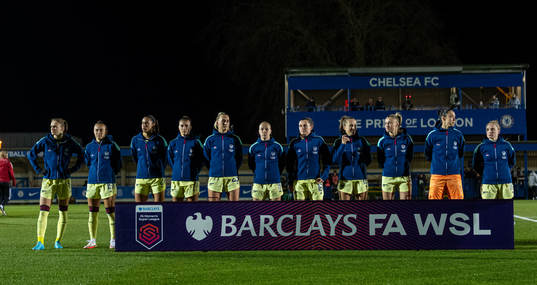 Stina Blackstenius of Arsenal line up with her teammates