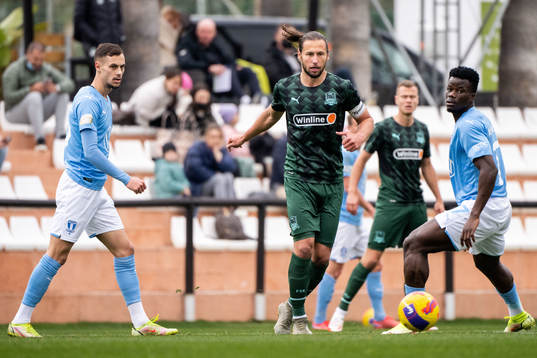 Grzegorz Krychowiak of Krasnodar and Veljko Birmancevic and