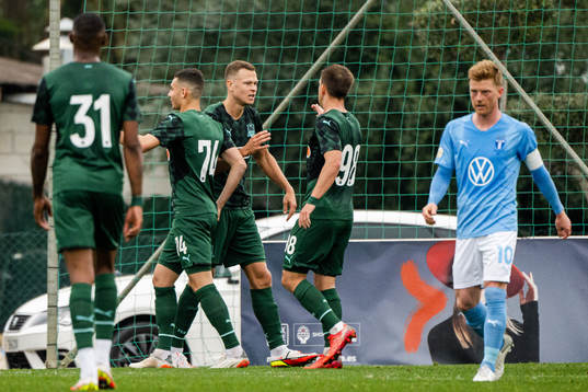 Viktor Claesson of Krasnodar celebrates with teammates