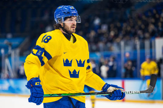 Dennis Everberg of Sweden in an ice hockey preliminary
