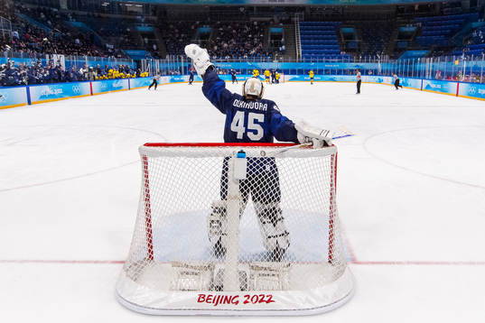 goaltender Jussi Olkinoura of Finland celebrate