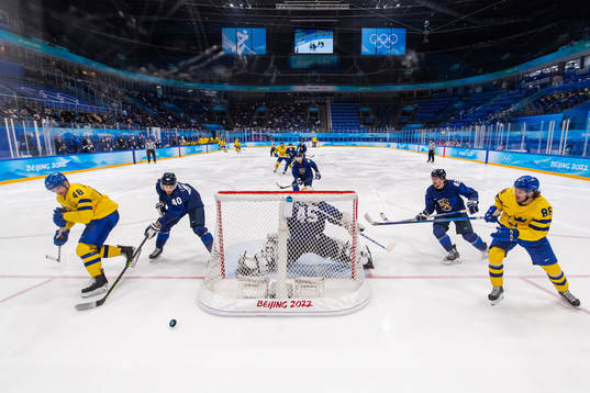 Carl Klingberg and Mathias Bromé of Sweden against Petteri