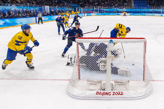 Marcus Krüger of Sweden with a chance against goaltender