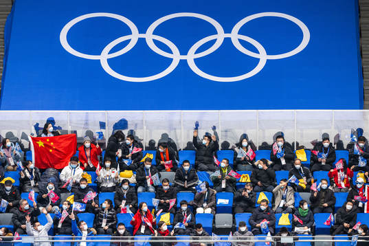 Spectators in the stands in an ice hockey preliminary round