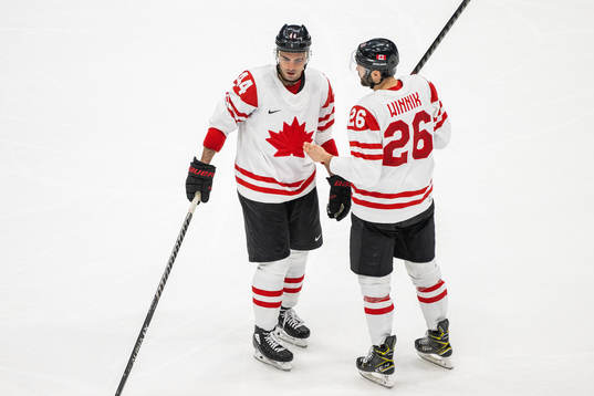 Mark Barberio and Daniel Winnik of Canada in an ice hockey