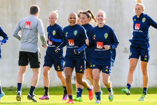 Madelen Janogy and Julia Roddar of Sweden warm up