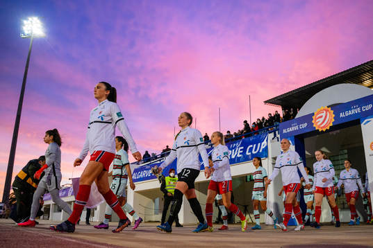 Ingrid Syrstad Engen of Norway enters the pitch with her