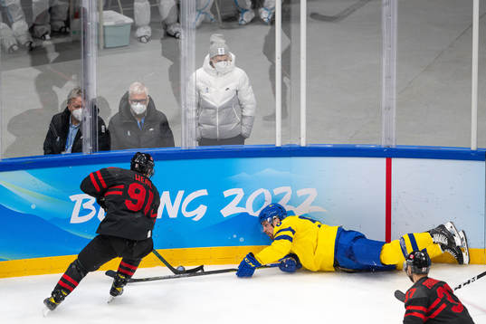 Jordan Weal of Canada and Anton Lander of Sweden in the