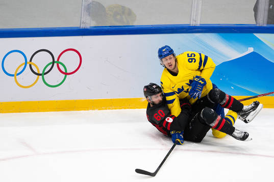 Jacob de la Rose of Sweden and Jason Demers of Canada in
