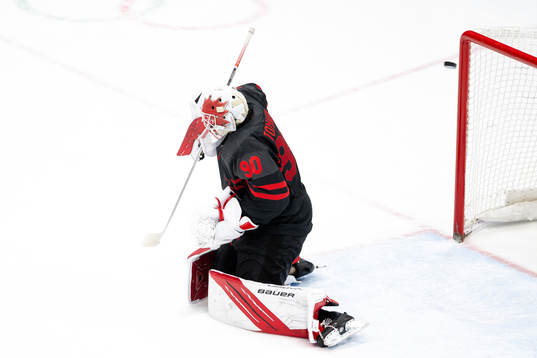 Goaltender Matt Tomkins of Canada let’s in the 1-0 goal