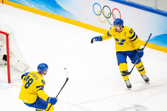 Carl Klingberg and Anton Lander of Sweden celebrate the 2-0