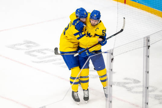 Carl Klingberg and Anton Lander of Sweden celebrate the 2-0