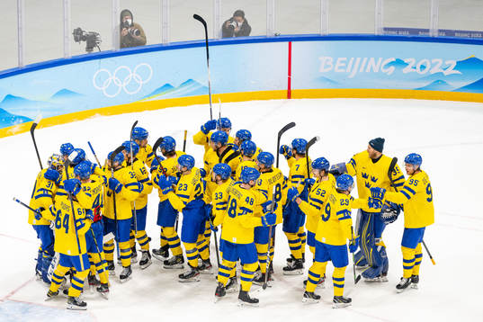Players of Sweden celebrate
