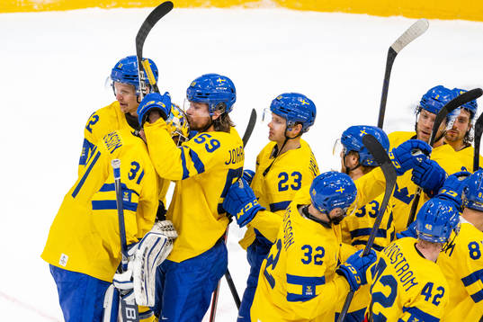 Goaltender Lars Johansson and Linus Johansson  of Sweden