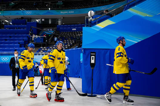 Max Friberg and Christian Folin of Sweden celebrate