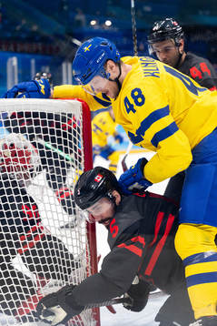 Morgan Ellis of Canada and Carl Klingberg of Sweden in the