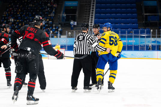 Eric O'dell of Canada and Anton Lander of Sweden in the