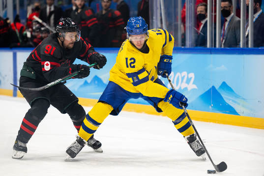 Jordan Weal of Canada and Max Friberg of Sweden in the