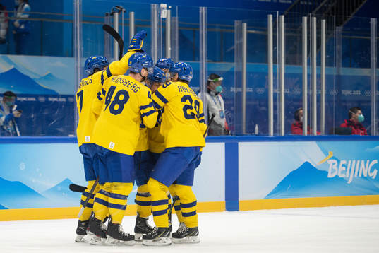 Players of Sweden celebrate the 2-0 goal by Anton Lander in