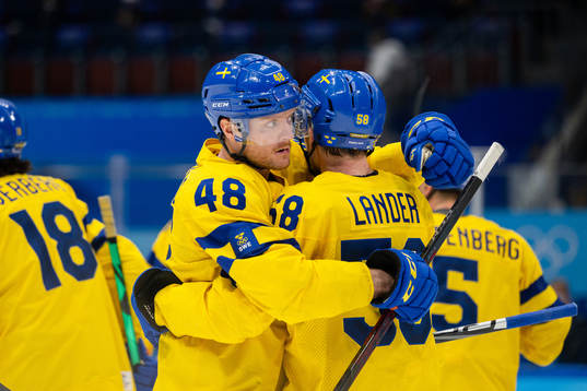 Carl Klingberg and Anton Lander of Sweden celebrate