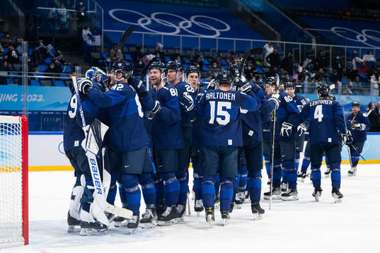 Goaltender Harri Sateri of Finland celebrate with teammates