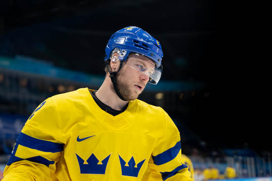 Christian Folin of Sweden looks dejected in the men’s ice