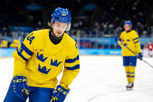 Jonathan Pudas of Sweden looks dejected in the men’s ice