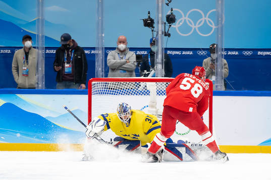 Goaltender Lars Johansson of Sweden with a save from Anton