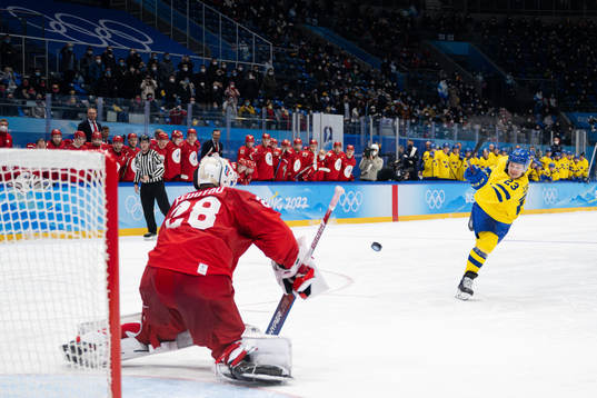 Goaltender Ivan Fedotov of Russia and Lucas Wallmark of