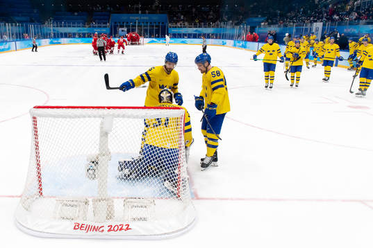 Goaltender Lars Johansson, Oscar Fantenberg and Anton