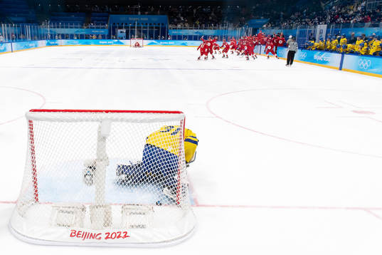 Goaltender Lars Johansson of Sweden looks dejected