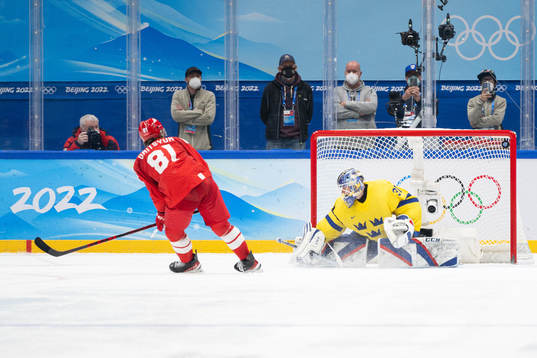Arseni Gritsyuk of Russia scores a penalty shot behind