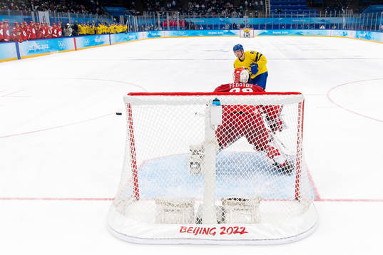 Carl Klingberg of Sweden against goaltender Ivan Fedotov of
