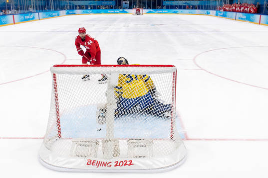 Yegor Yakovlev of Russia against goaltender Lars Johansson