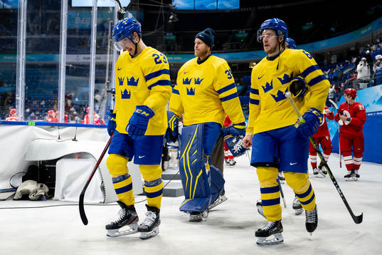 Lucas Wallmark, goaltender Magnus Hellberg and Jonathan